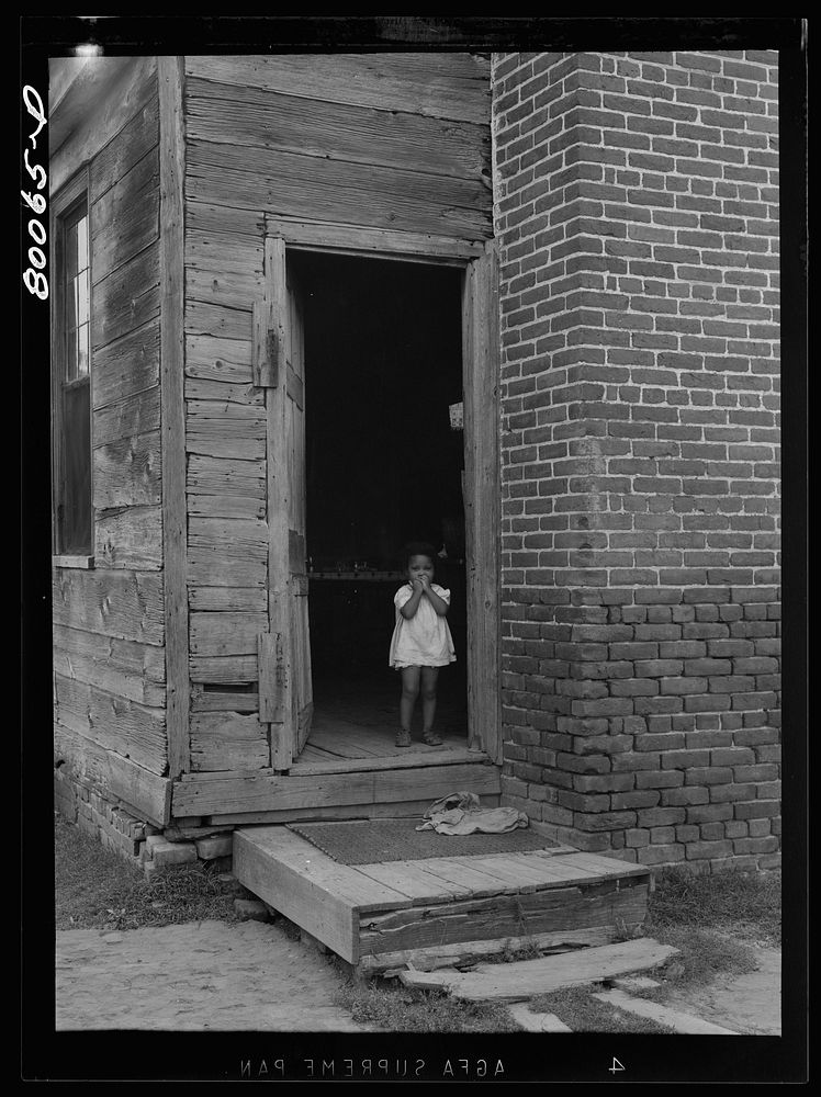 An unscreened door is an invitation for flies and illness near La Plata, Maryland. Charles County. Sourced from the Library…