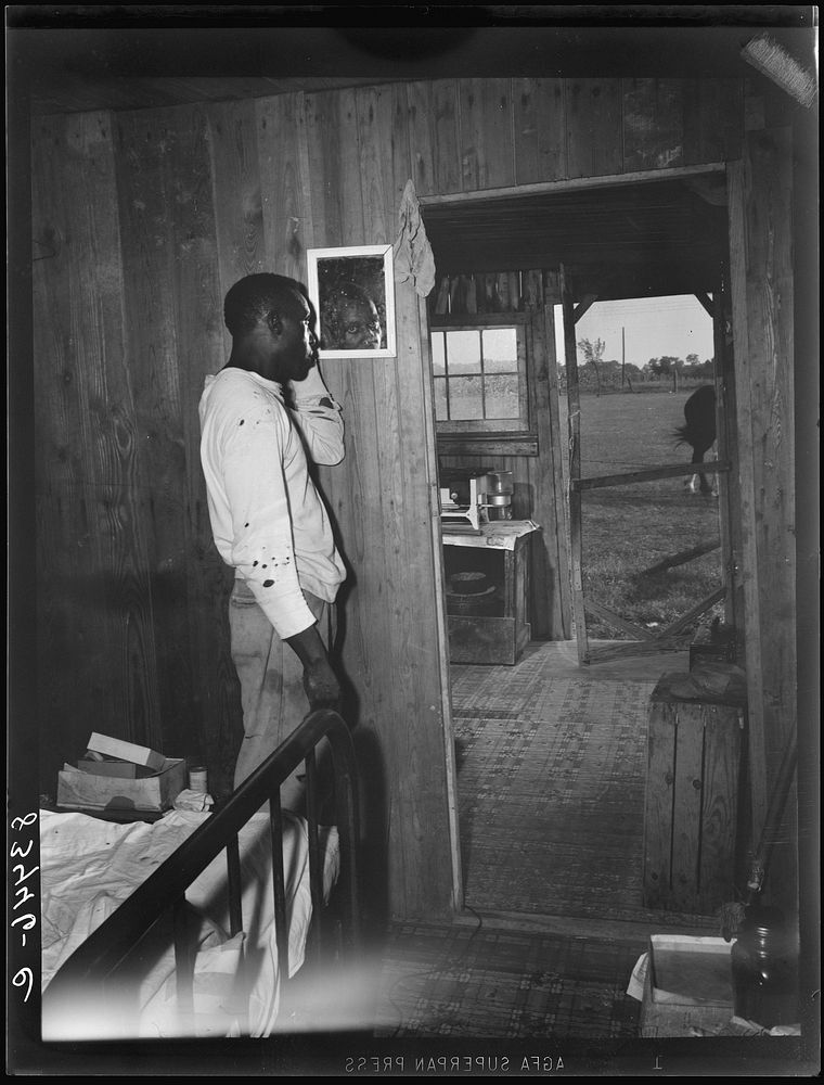 Bridgeton, New Jersey. FSA (Farm Security Administration) agricultural workers' camp. Picker and farmhand who lives by…