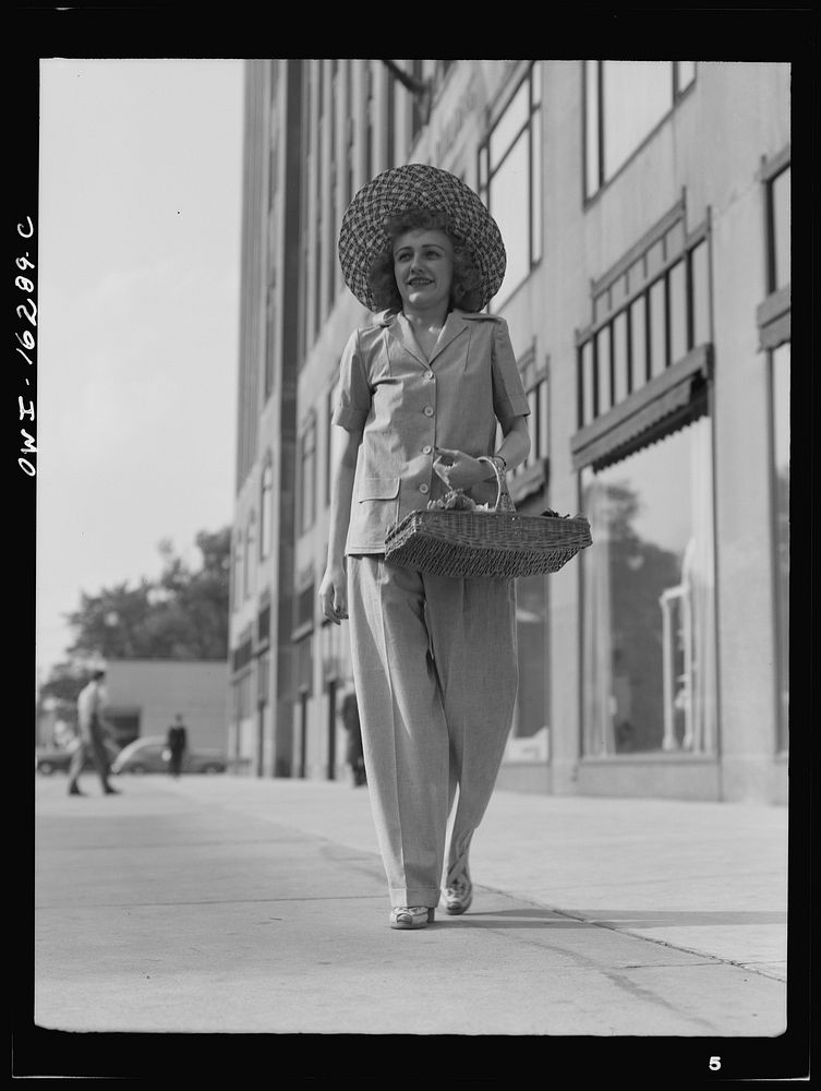 [Untitled photo, possibly related to: Detroit, Michigan. Style show of clothes worn by the better-dressed office workers…