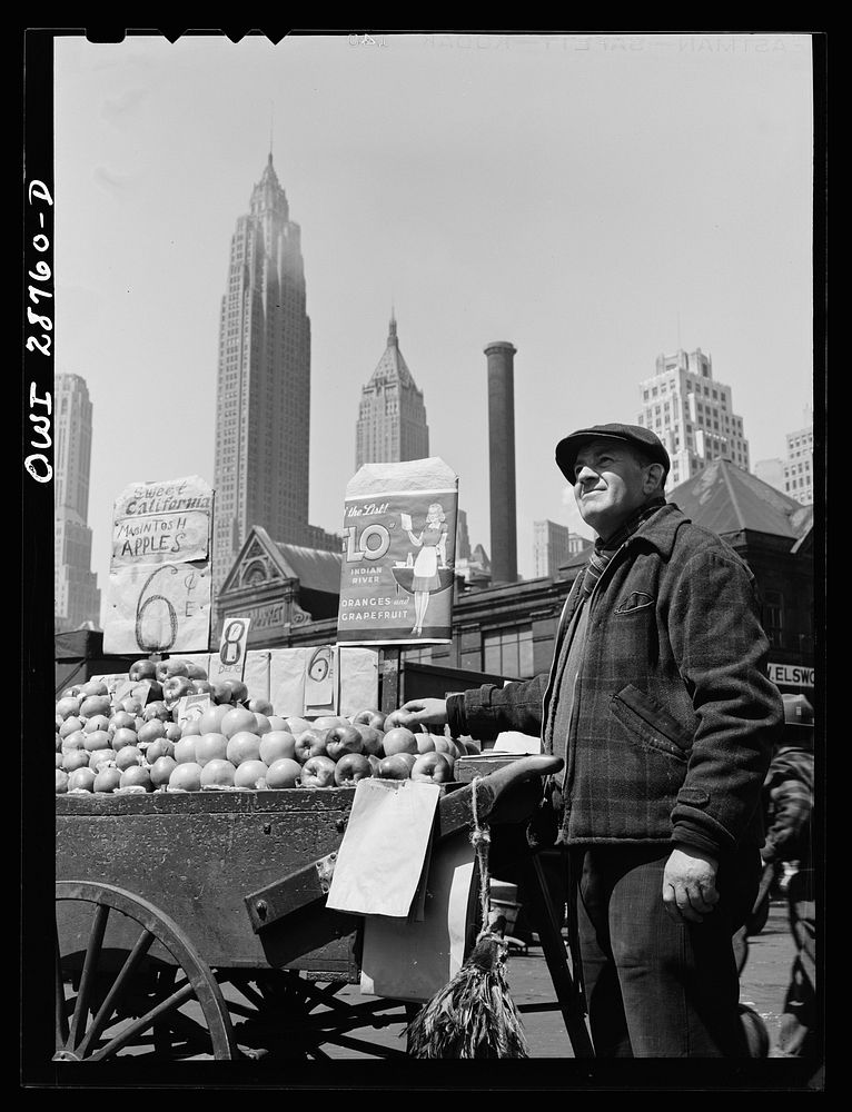 New York, New York. Push cart fruit vendor at the Fulton fish market. Sourced from the Library of Congress.