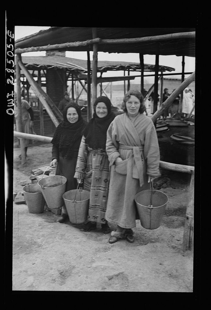 Teheran, Iran. Polish refugees at an American Red Cross camp using woolen bathrobes donated by the Red Cross as overcoats.…