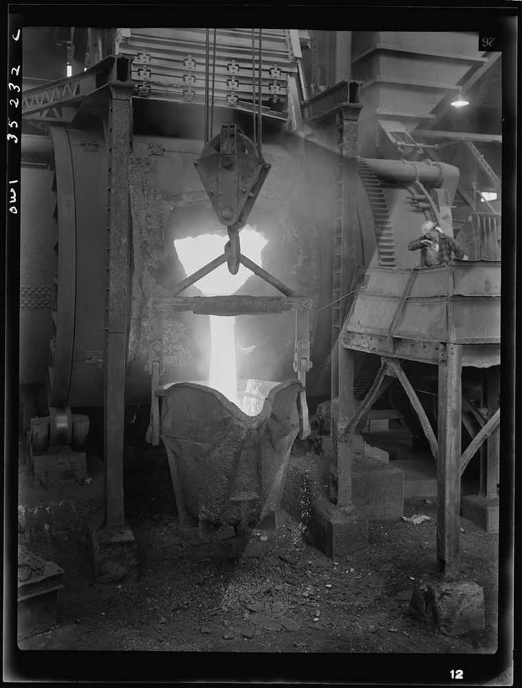[Untitled photo, possibly related to: Garfield, Utah. Making molds of blister copper at the Garfield smelter of the American…