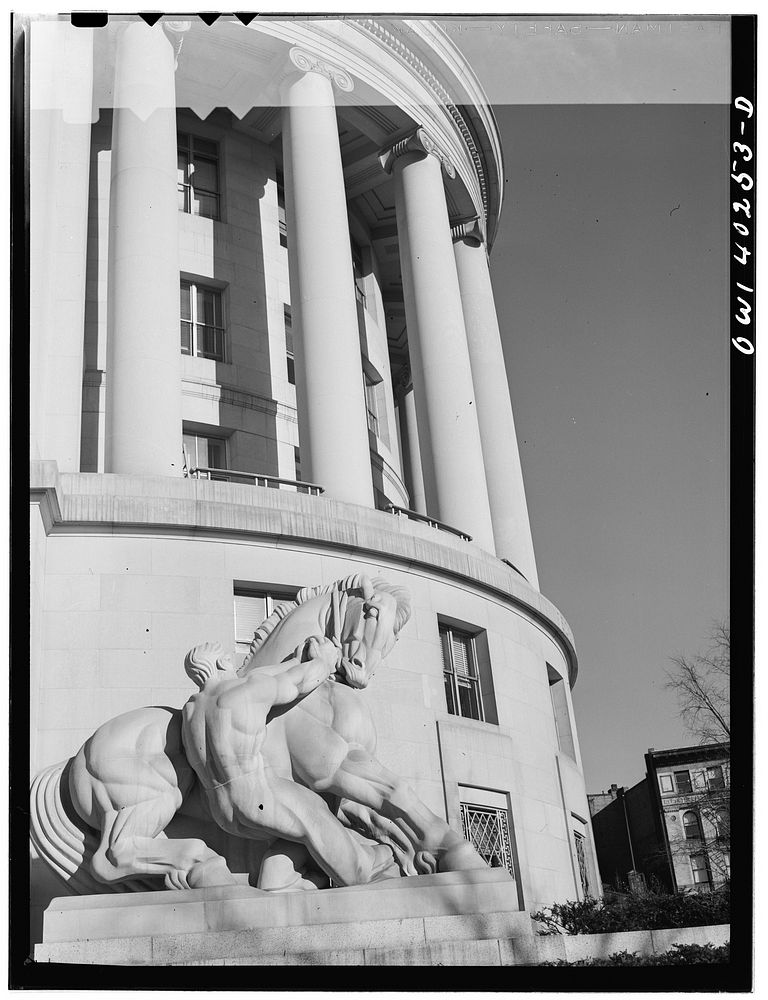 [Untitled photo, possibly related to: Washington, D.C. A statue in front of the Federal Trade Commission building]. Sourced…