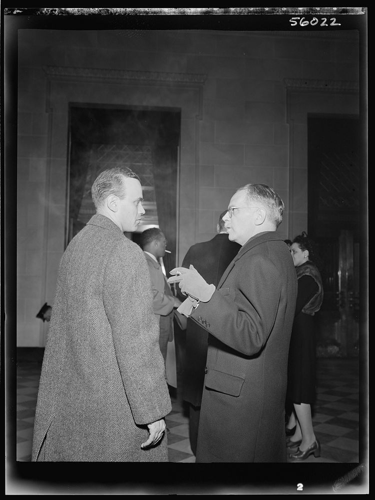 Two members of the audience at the ceremony held in the auditorium of the U.S. Department of the Interior at the dedication…