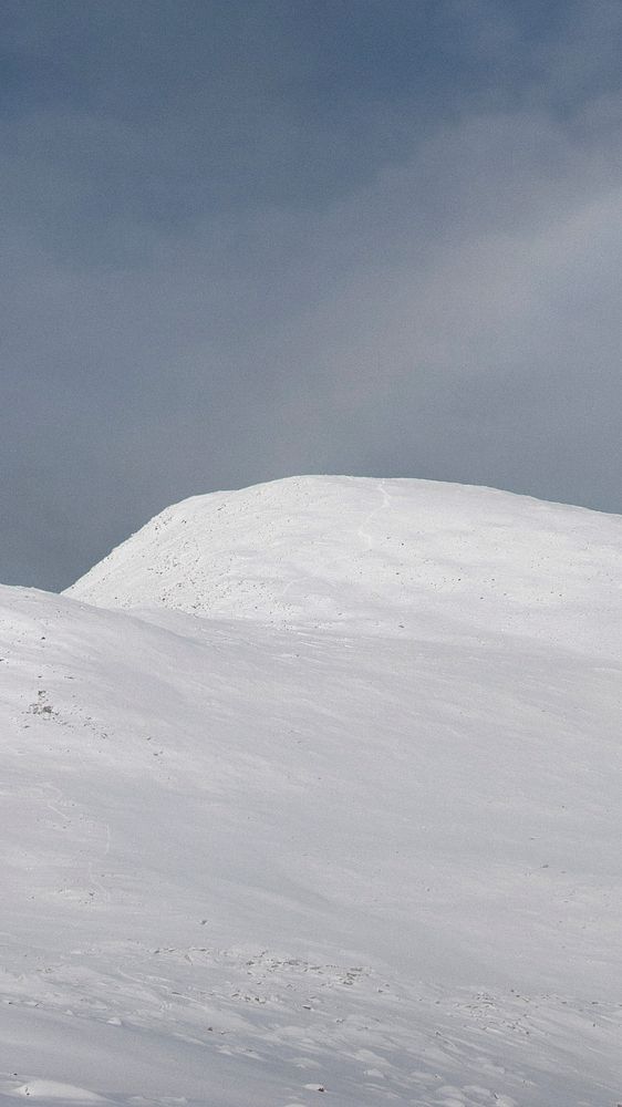 Winter phone wallpaper background, snowy mountain views in winter