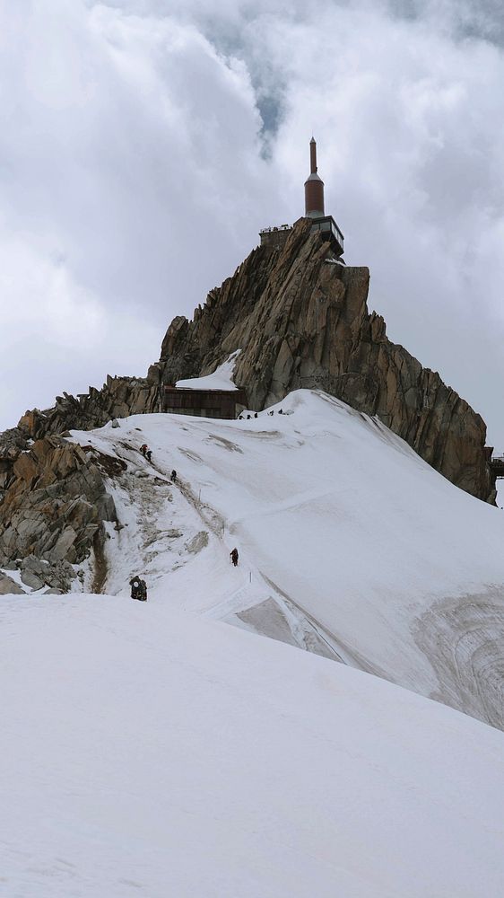Winter iPhone wallpaper background, Rocky Aiguille du Midi covered in snow