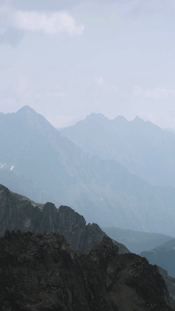 Hiking on Aiguille Rouge overlooking the Mont Blanc massif