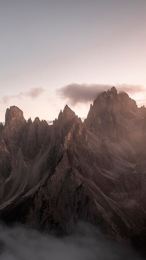 Nature phone wallpaper background, misty Tre Cime di Lavaredo in Dolomites, Italy