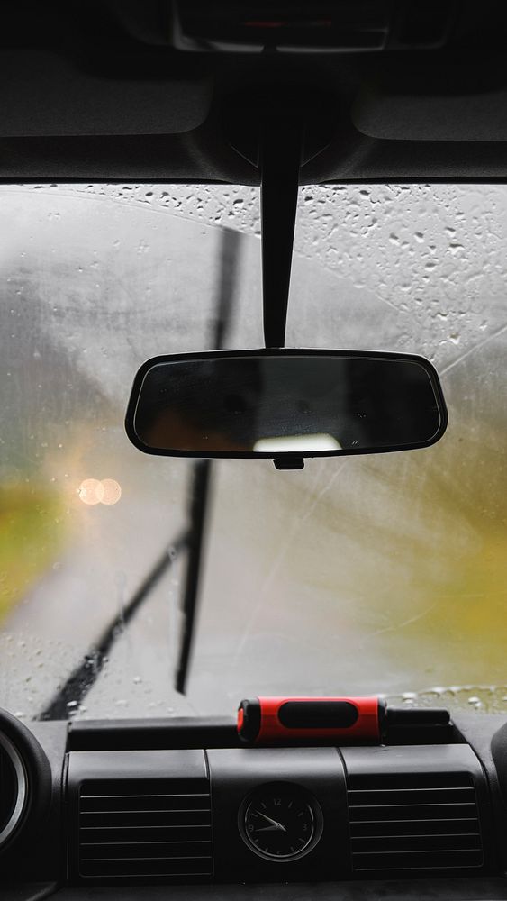 Roadtrip mobile wallpaper background, rainy day view from inside of a car