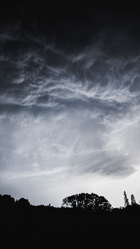 Nature phone wallpaper background, stormy night sky in the countryside