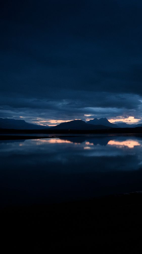 Nature phone wallpaper background, blue hour from a car window