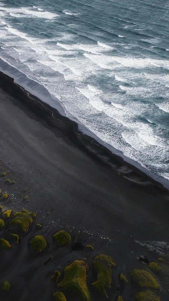 Nature mobile wallpaper background, black sand beach in Icelandic coast