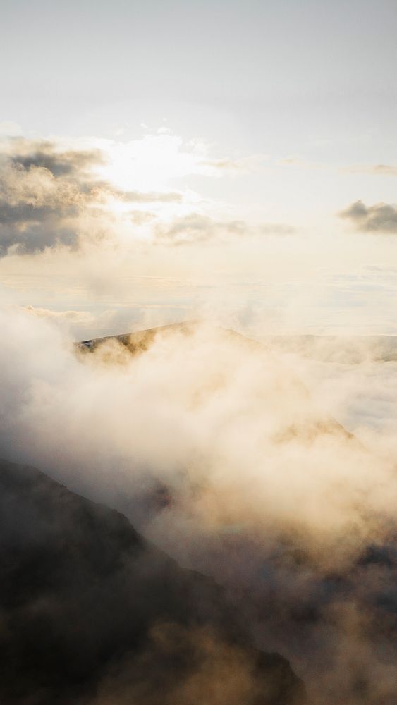 Nature mobile wallpaper background, cloudy sky over mountains background