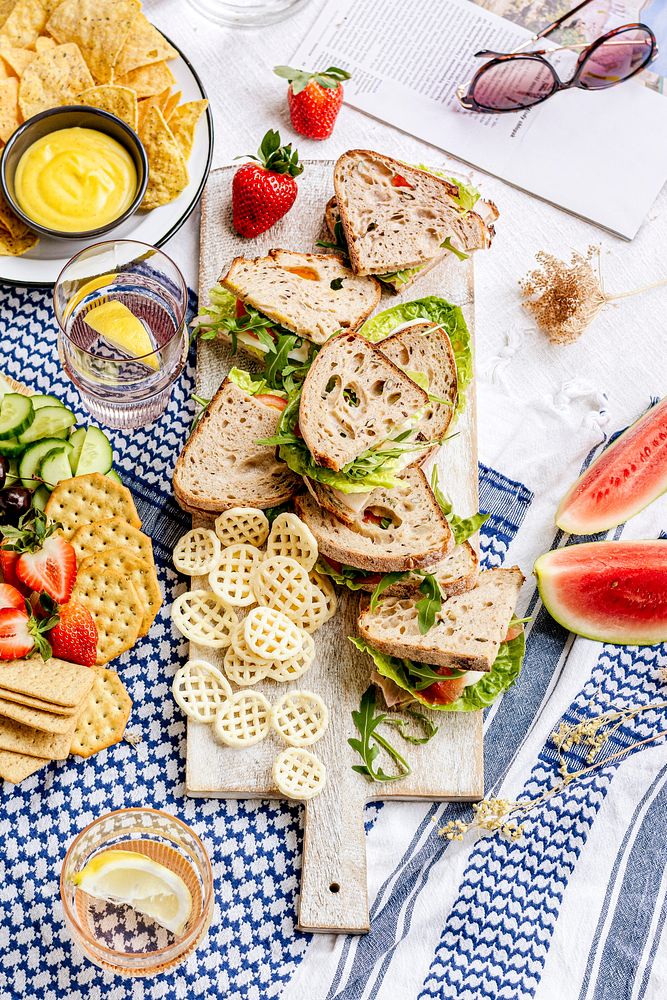 Picnic wholewheat sandwiches on a cutting board