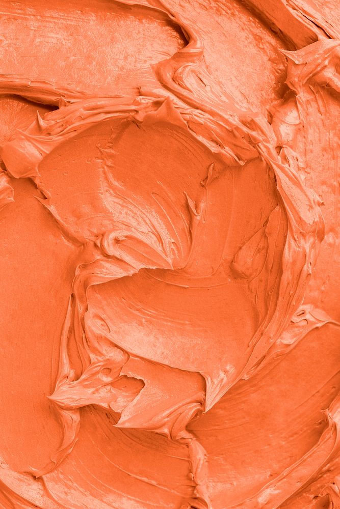 Orange frosting texture background close-up
