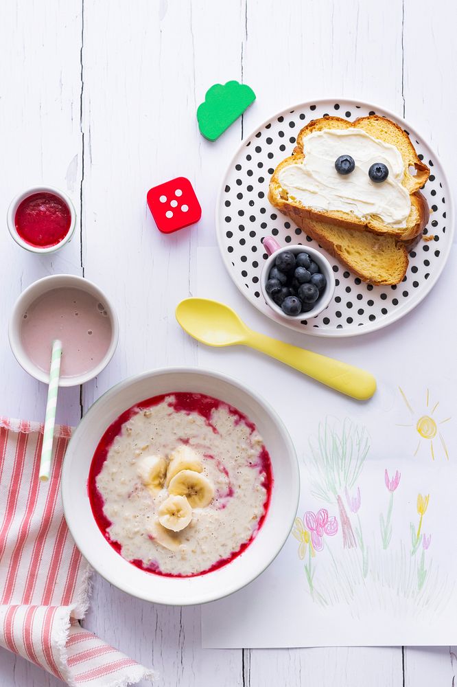 Cute kids breakfast, toast cream cheese and blueberries