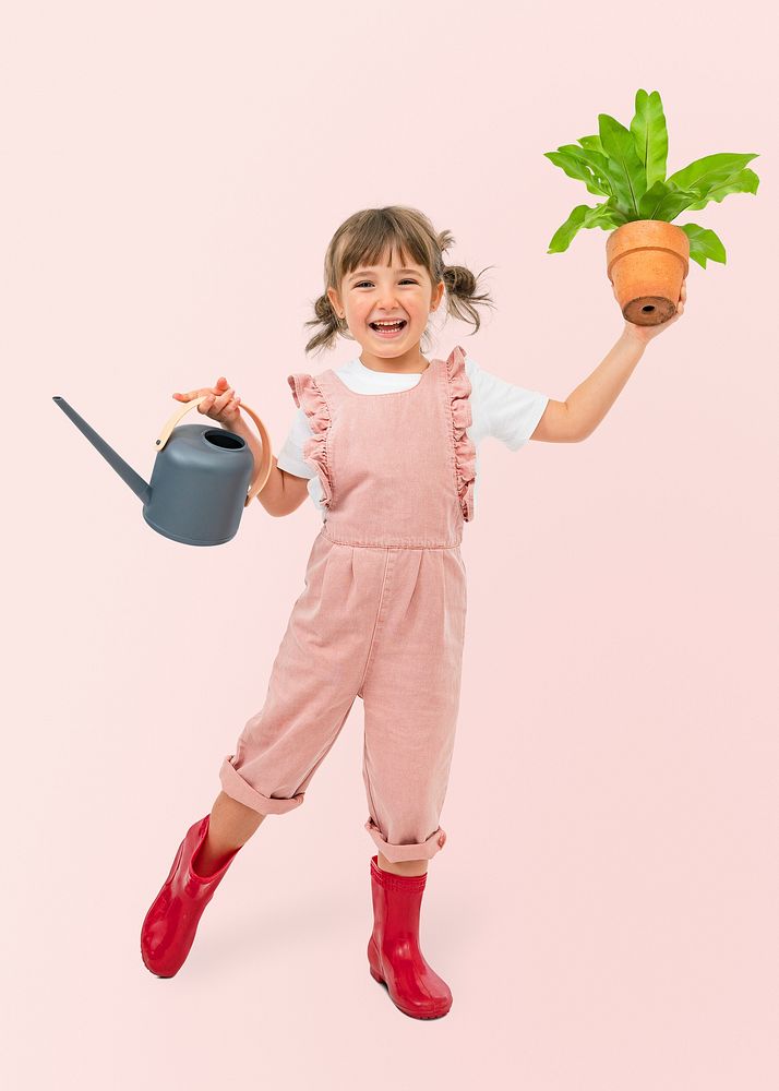 Studio shot kid with potted plants