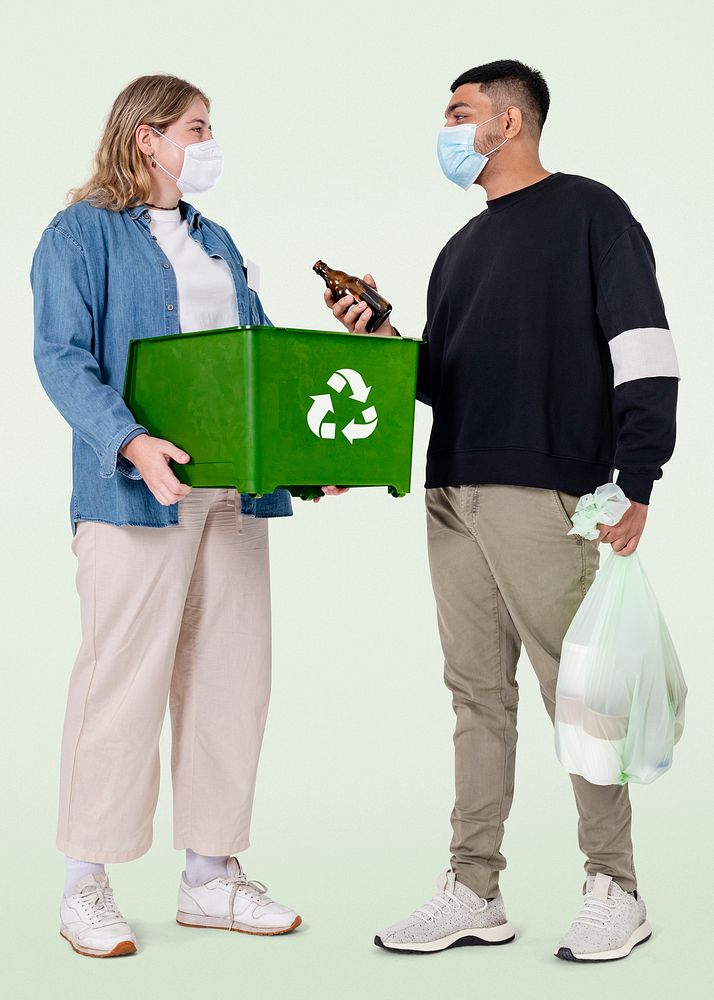 Beach cleanup volunteer with recycle bin save the earth campaign