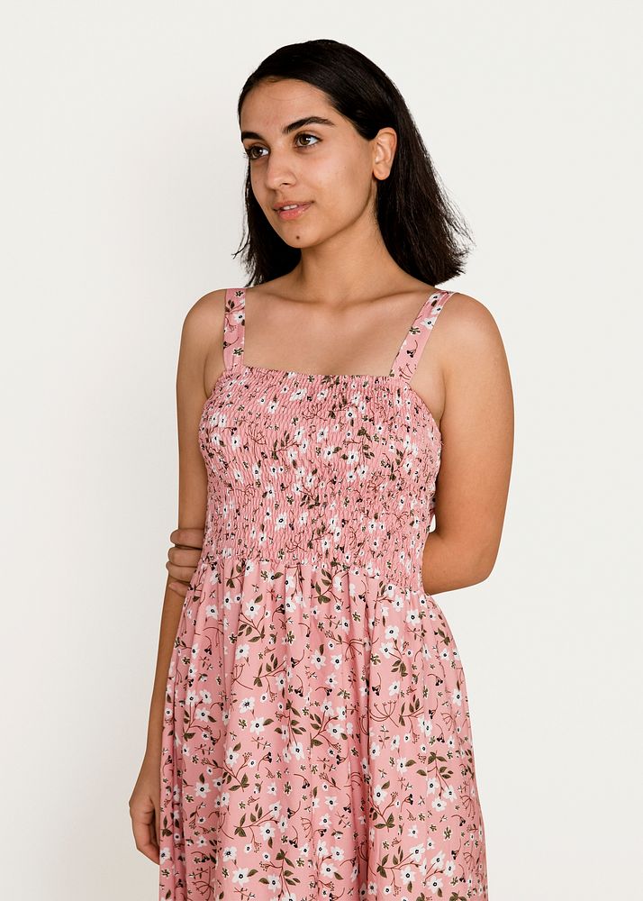 Woman wearing a pink floral dress