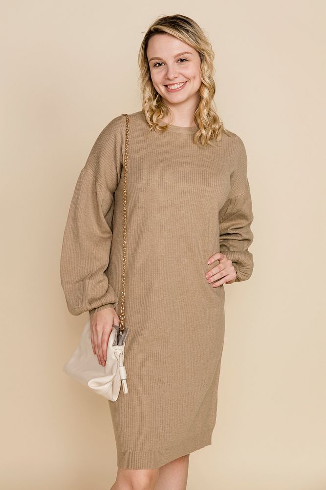 Blonde woman in casual sweater dress