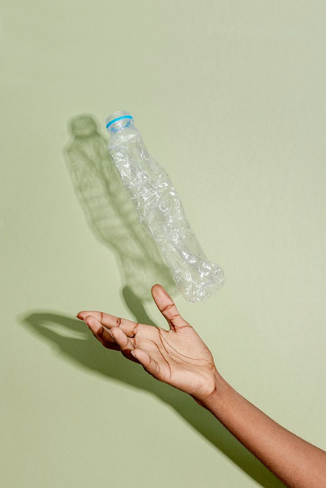 Plastic pollution background with recycling water bottle