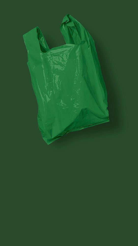 Single use green plastic bag background