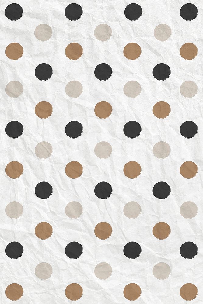Polka dot pattern vector in black and gold on crumpled paper textured background