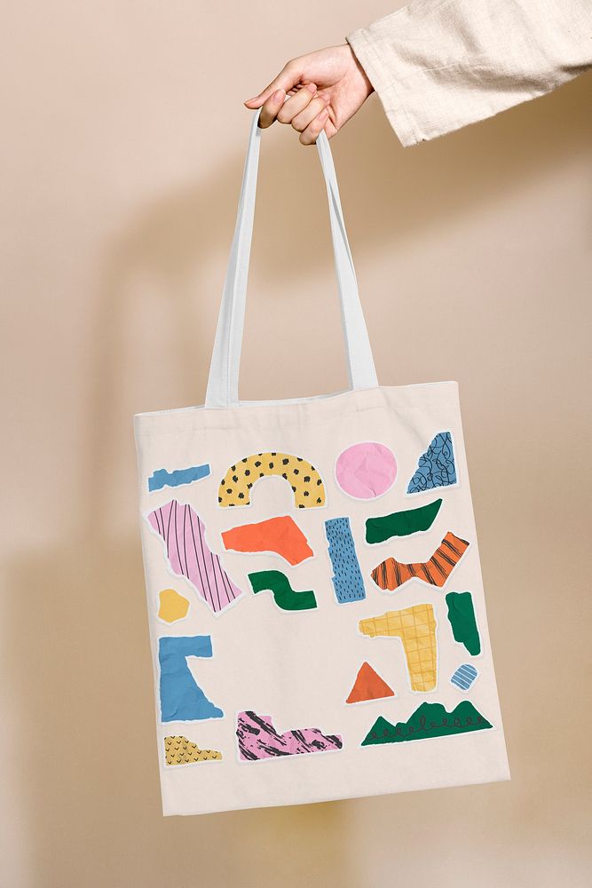 Tote bag with ripped paper collage pattern
