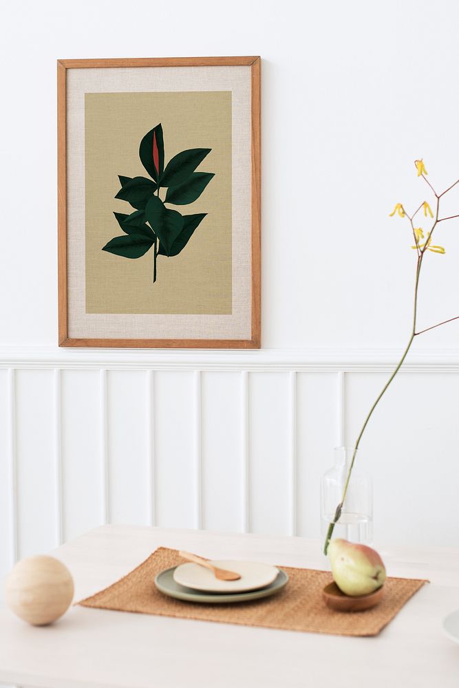 Minimal dining room decorated with plant picture frame
