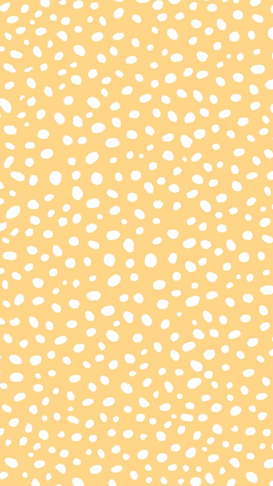 Yellow background vector with white dot patterns