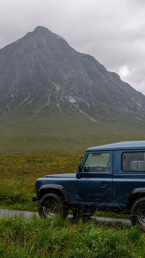 Adventure phone wallpaper background, SUV on a road through the Scottish Highlands, Scotland