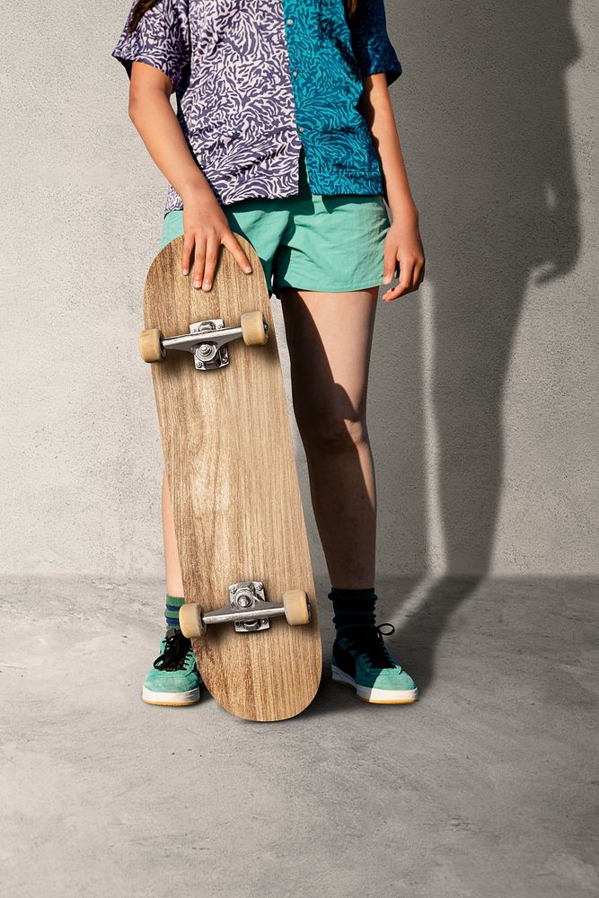 Teen girl with skateboard, summer hobby sport activity
