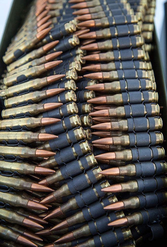 Strips of 7.62x51mm ball ammunition are staged for M240B machine gun live fire training at Grezelka range, Joint Base…