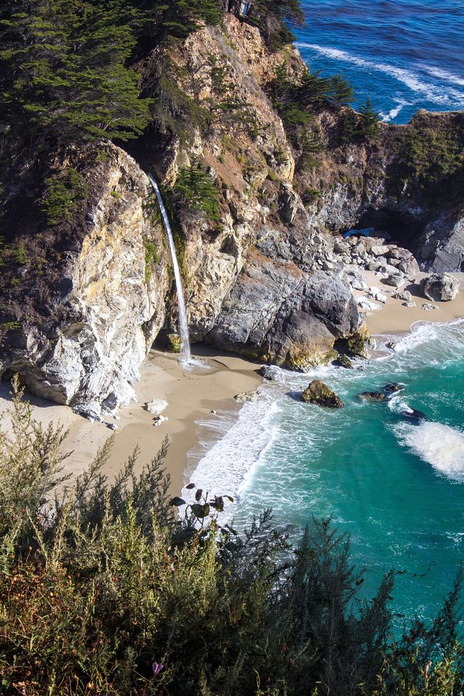 Beach waterfall in California. Free public domain CC0 image.