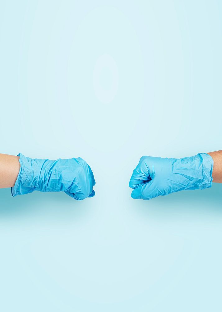 Medical staff bumping, blue background