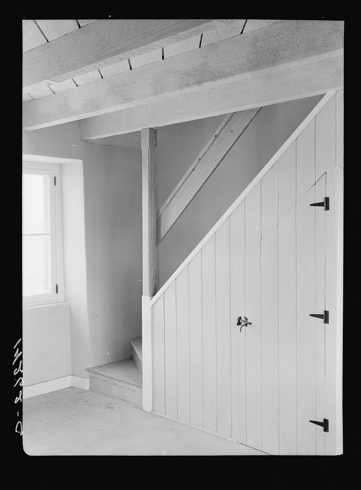 Chandler, Arizona. Stairs and storage in one of the houses at Chandler Farms, a Farm Security Administration part-time…
