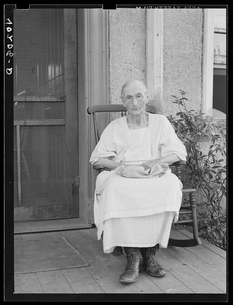 Barto, Berks County, Pennsylvania. Mrs. Springer, Mrs. Evans grandmother, on the front porch, on the farm of Thomas G.…