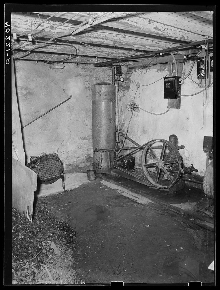 Lancaster County, Pennsylvania. The pressure pump in the cellar of the farmhouse on the Enos Royer farm. Sourced from the…