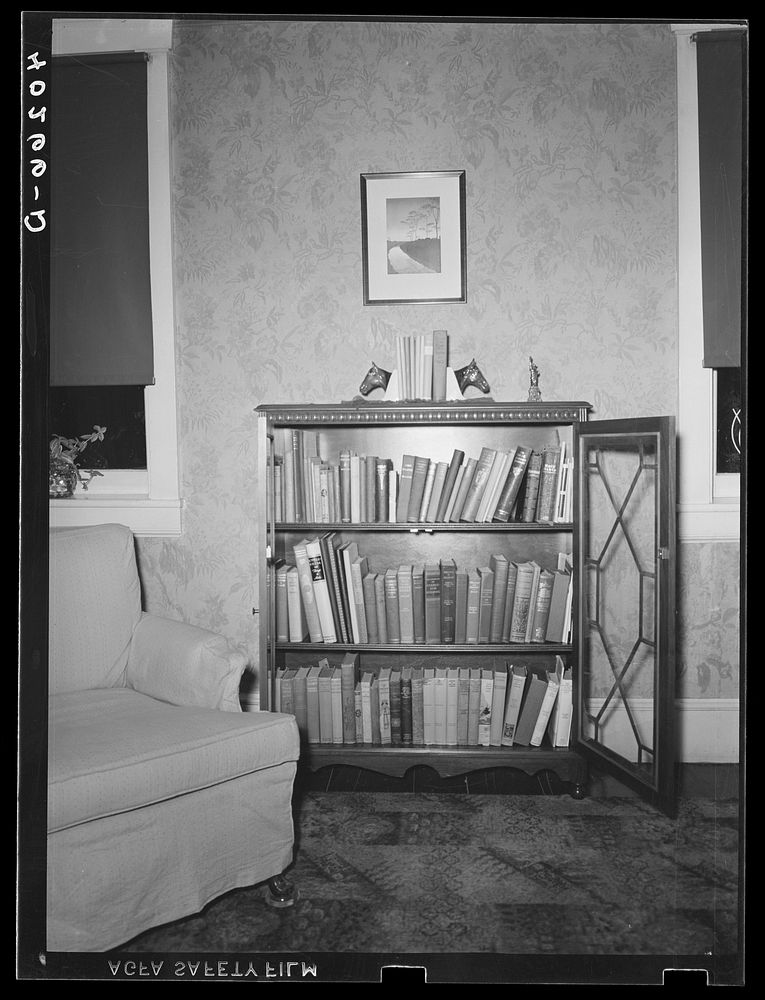 Lancaster County, Pennsylvania. A bookcase in the living room of the house on the Enos Royer farm.. Sourced from the Library…