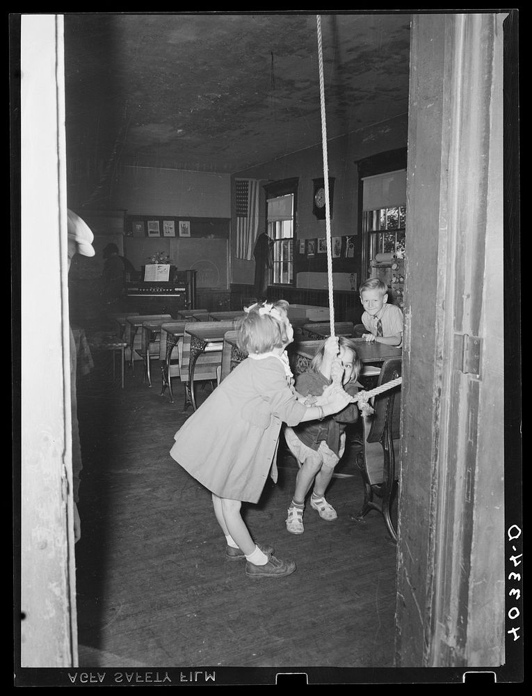 Lancaster County, Pennsylvania. Children ringing the school bell at the schoolhouse in which Martha Royer teaches. Sourced…