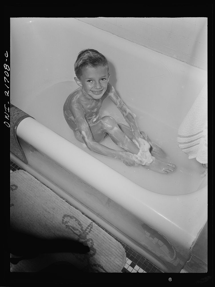 [Untitled photo, possibly related to: Rochester, New York. Earl Babcock enjoying his daily bath]. Sourced from the Library…