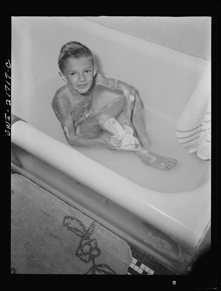 Rochester, New York. Earl Babcock enjoying his daily bath. Sourced from the Library of Congress.