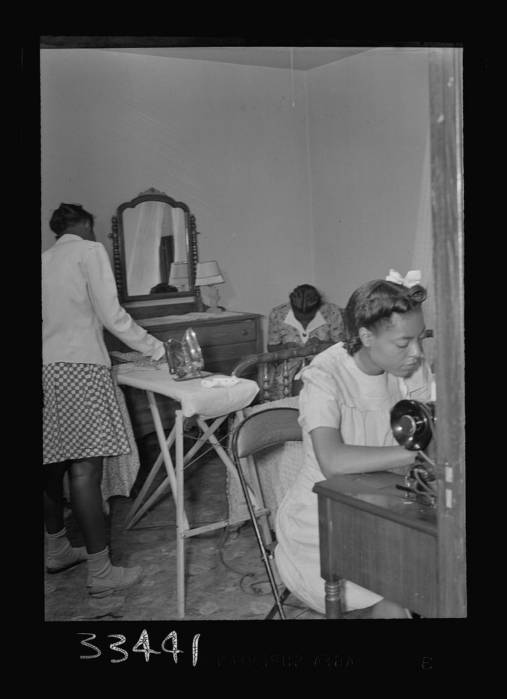 [Untitled photo, possibly related to: Charlotte Corut House, Virginia. Central High School. Girls in the kitchen of home…