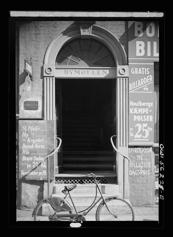 Copenhagen, Denmark. The doorway of a grocery store. Sourced from the Library of Congress.