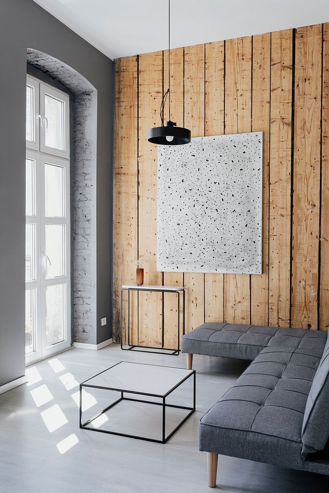 Minimal home decor with an artwork on a wooden wall
