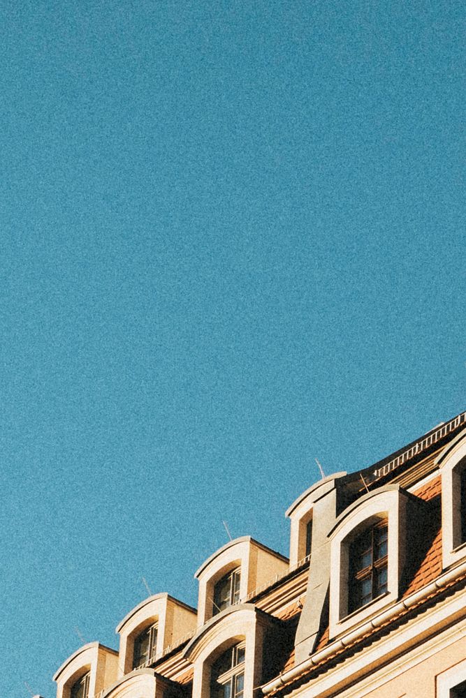 Classic European apartment building under the blue sky