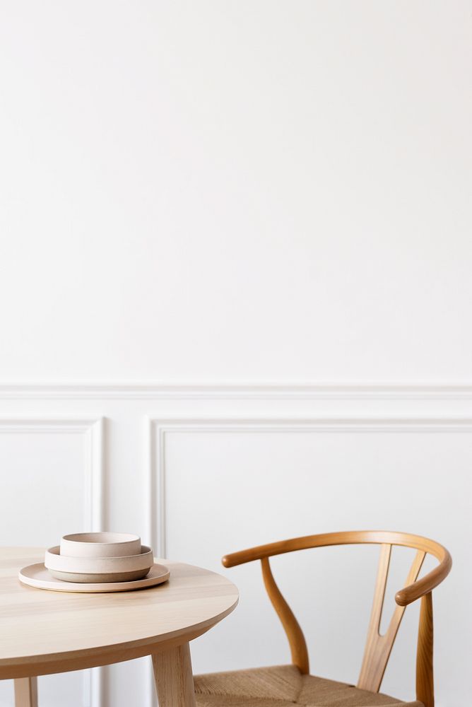 Clean and minimal dining room table with chair