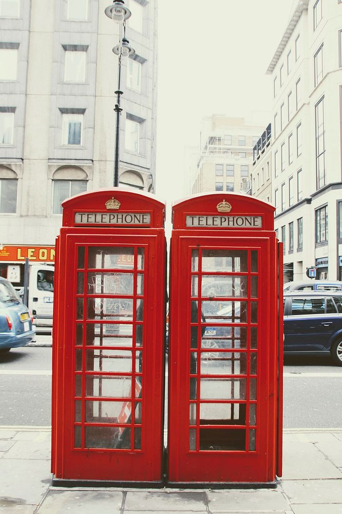 Free iconic red telephone booths in London, UK image, public domain CC0 photo.