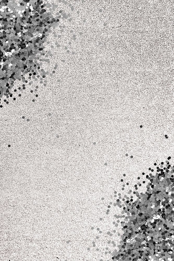 Gray glitter confetti on a silver background 