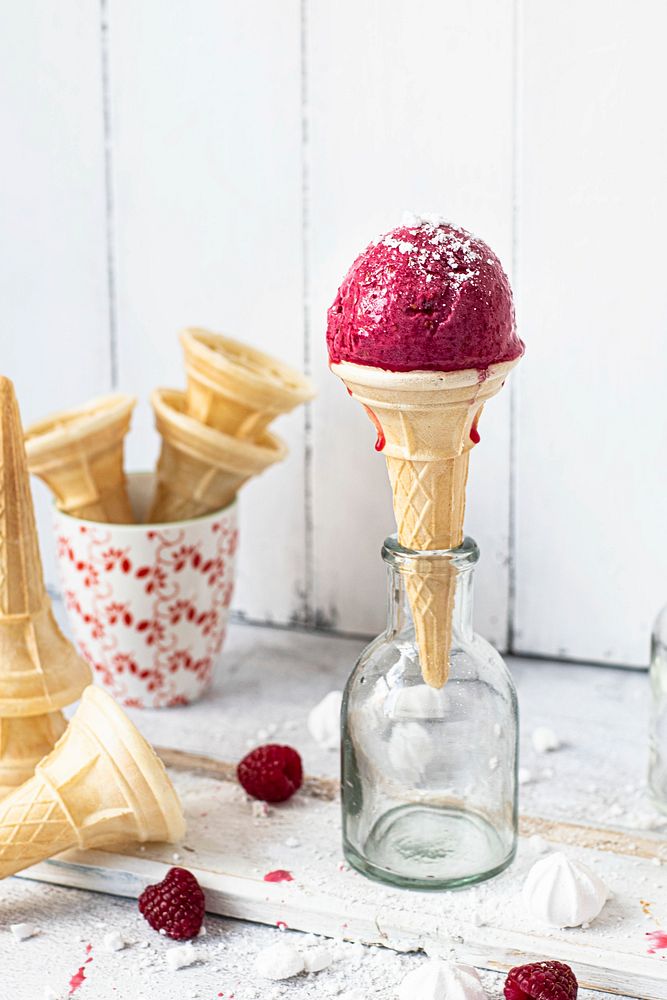 Raspberry ice cream cone in a a glass bottle